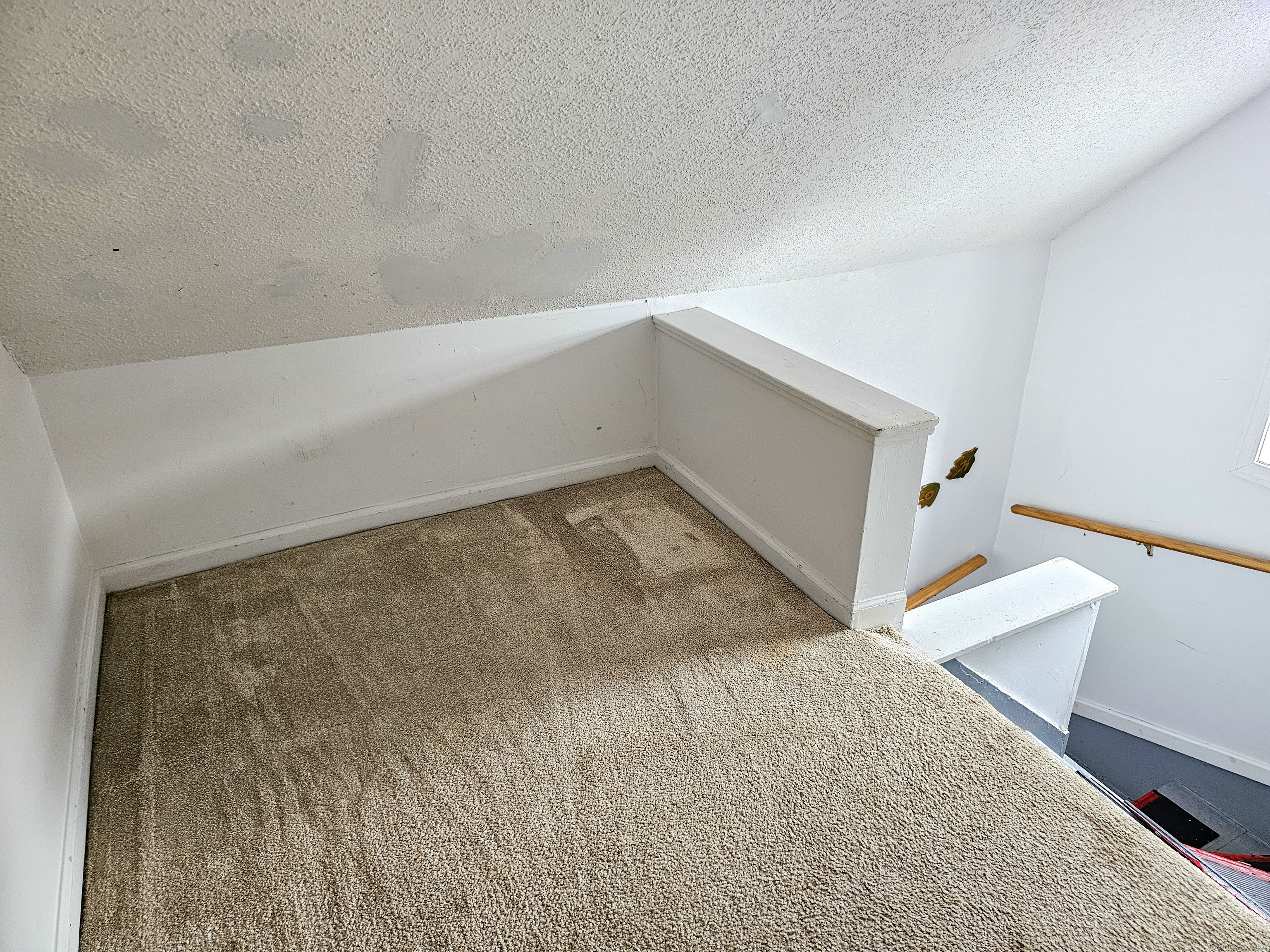 54 Washington Street, Unit 3 Wallingford, CT 06492 - Photo 9 of 9 a view of an empty room and wooden floor