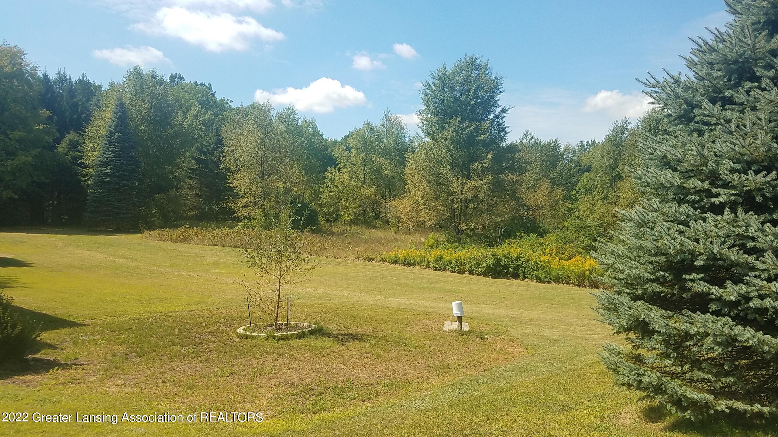 2390 South Edgar Road Mason, MI 48854 - Photo 32 of 40 Exterior Rear View from ground level