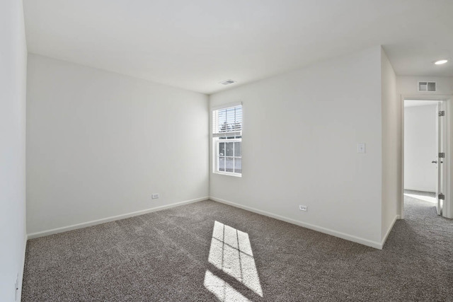 18 West Lake Court Cary, IL 60013 - Photo 17 of 21 an empty room with windows