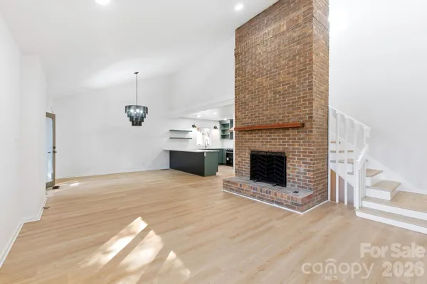 a view of a livingroom with a fireplace