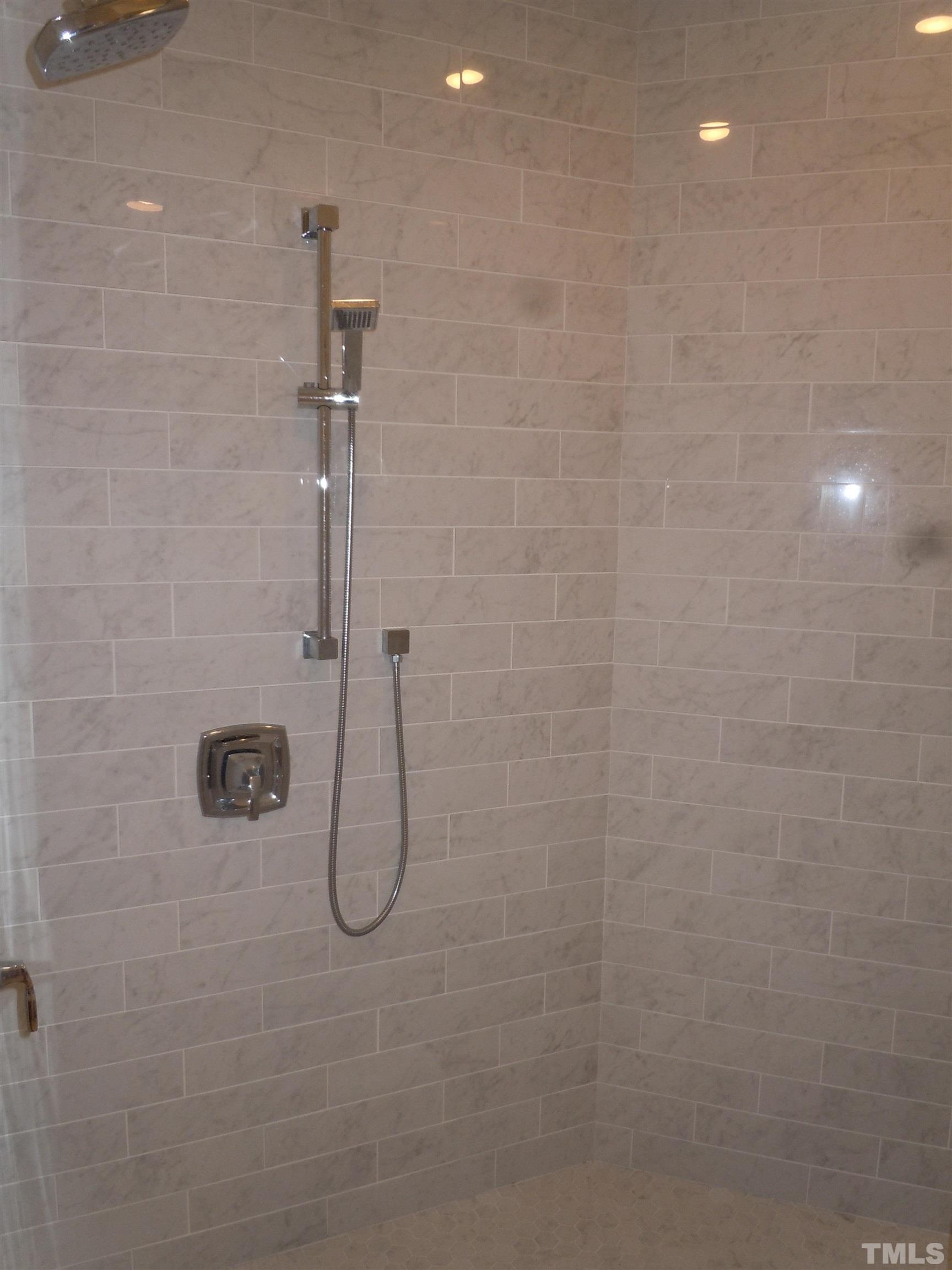 1009 Marilyn Drive Raleigh, NC 27607 - Photo 23 of 36 a bathroom with a shower