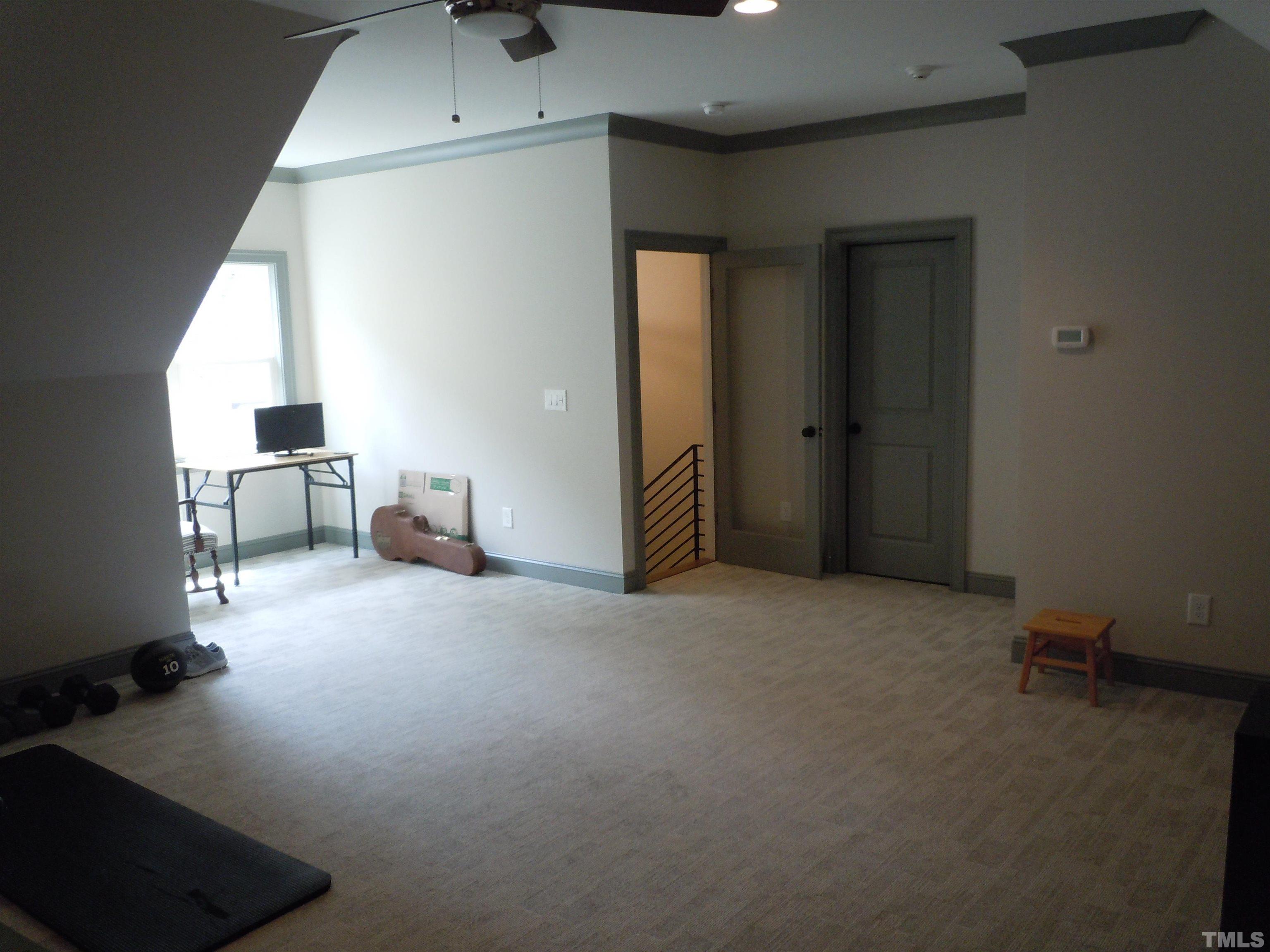 1009 Marilyn Drive Raleigh, NC 27607 - Photo 35 of 36 a view of livingroom with furniture and windows