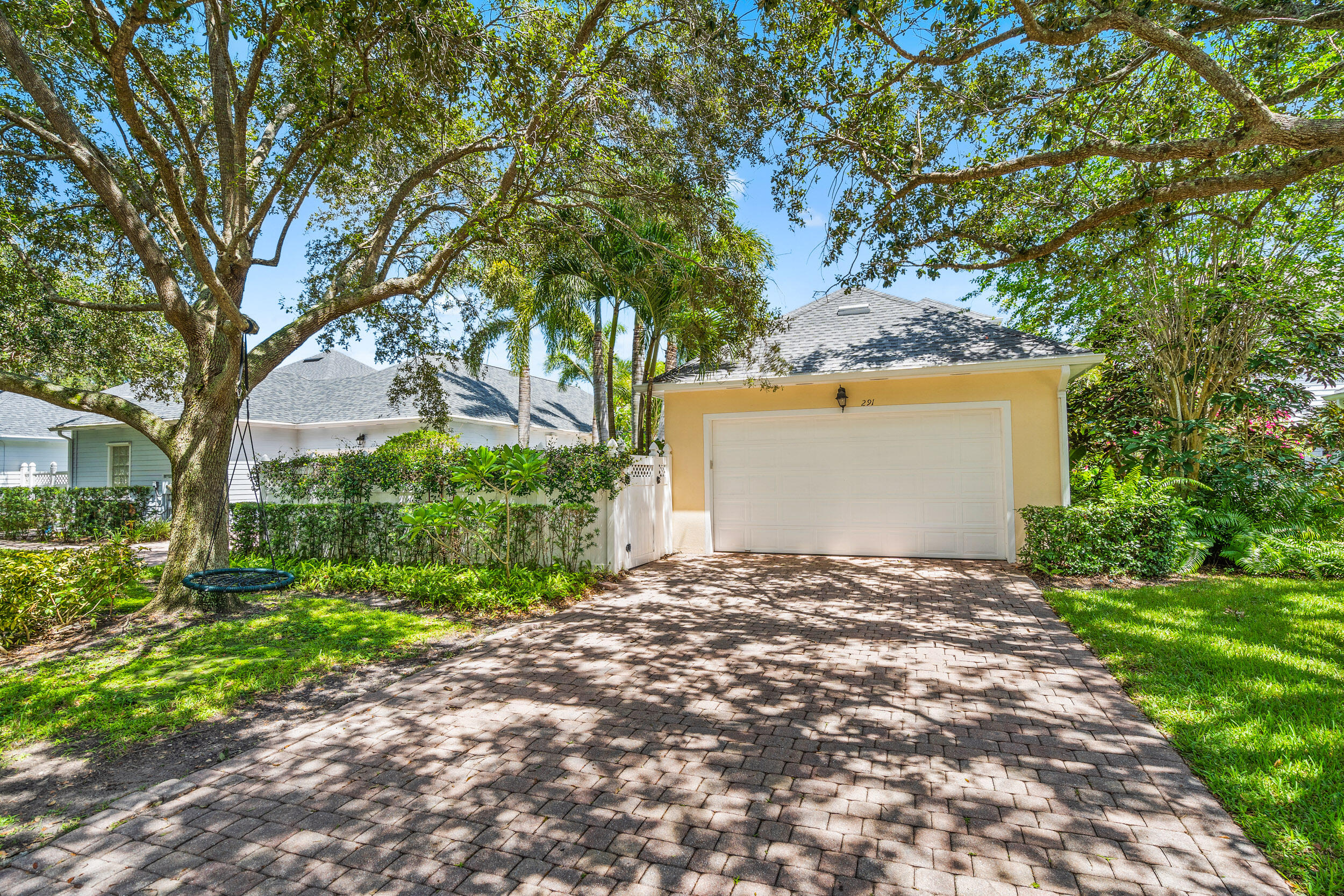 291 Barbados Drive Jupiter, FL 33458 - Photo 24 of 27 Garage/Driveway
