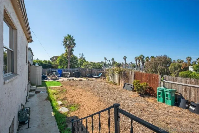 a view of a backyard with a patio