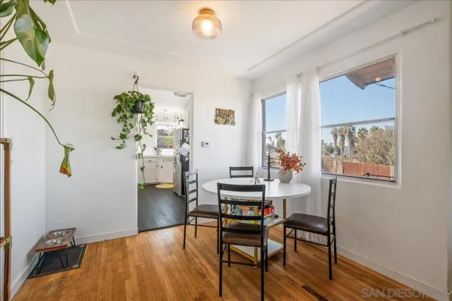 a kitchen with a sink cabinets and window