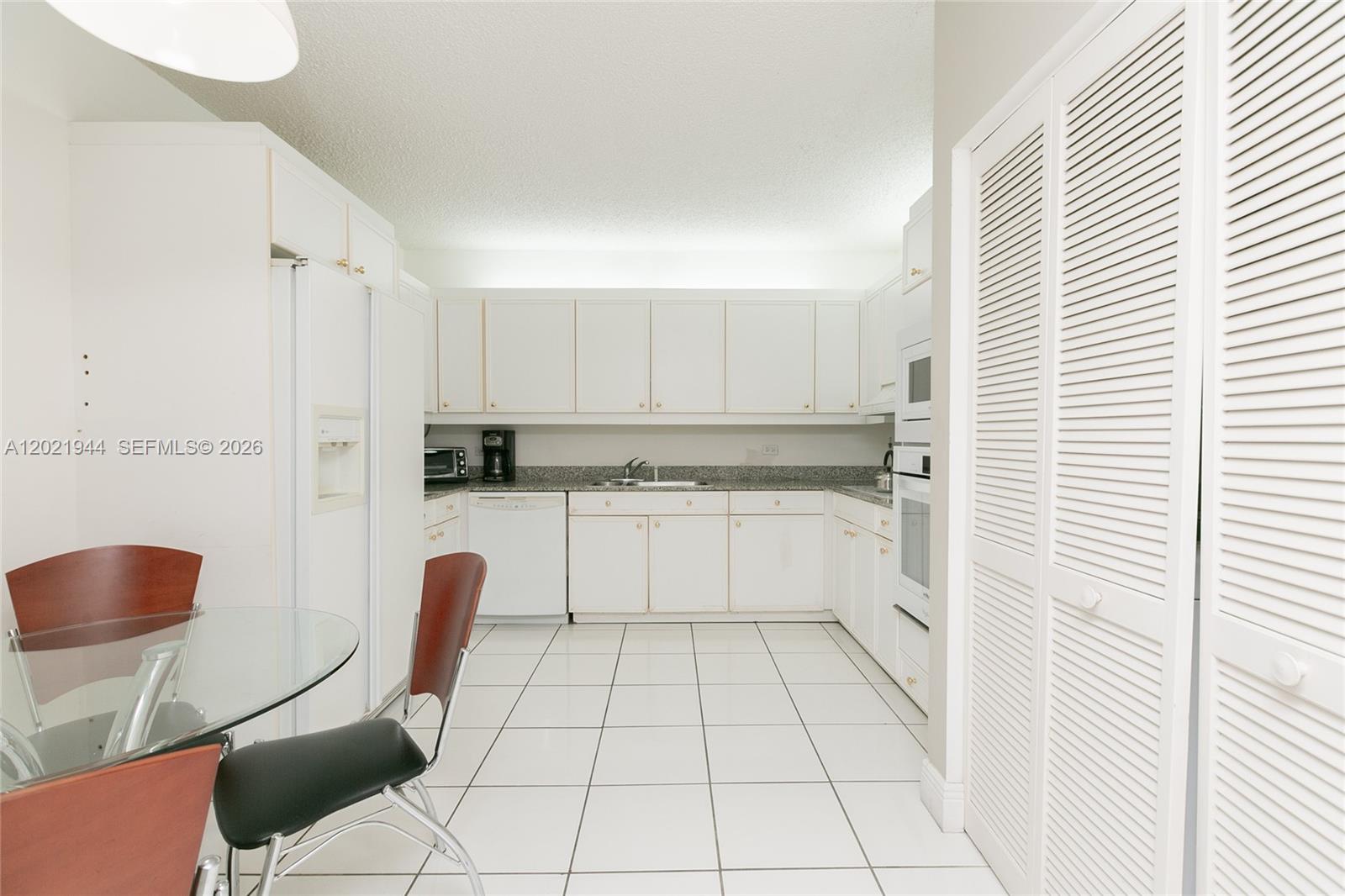 8855 Collins Avenue, Unit 6F Surfside, FL 33154 - Photo 13 of 26 Refrigerator has been replaced with a new unit