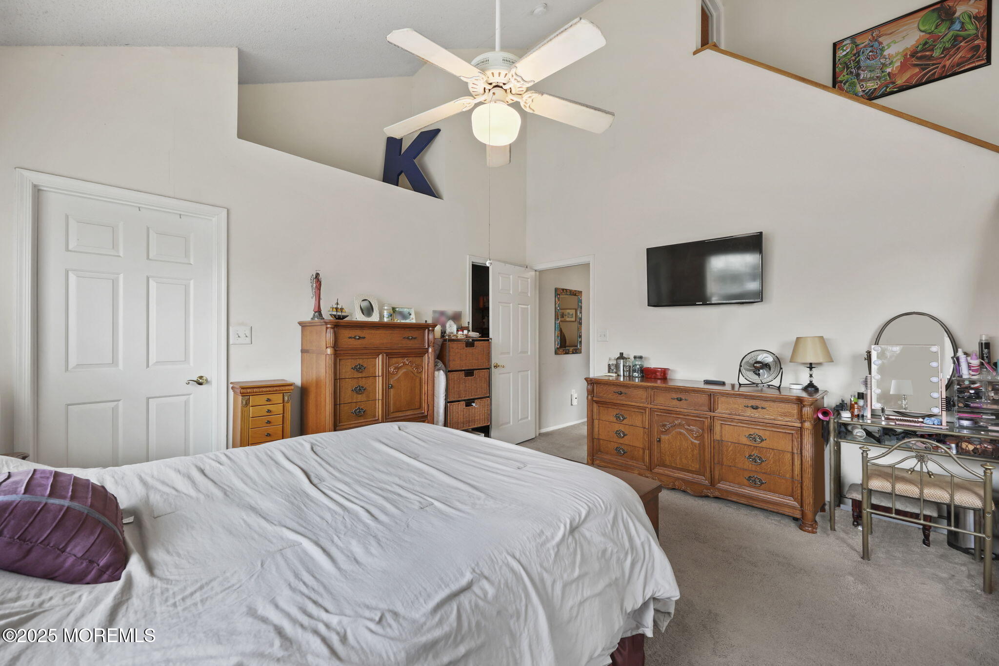 2 Madison Court Tinton Falls, NJ 07712 - Photo 16 of 22 a bedroom with a bed and a flat screen tv