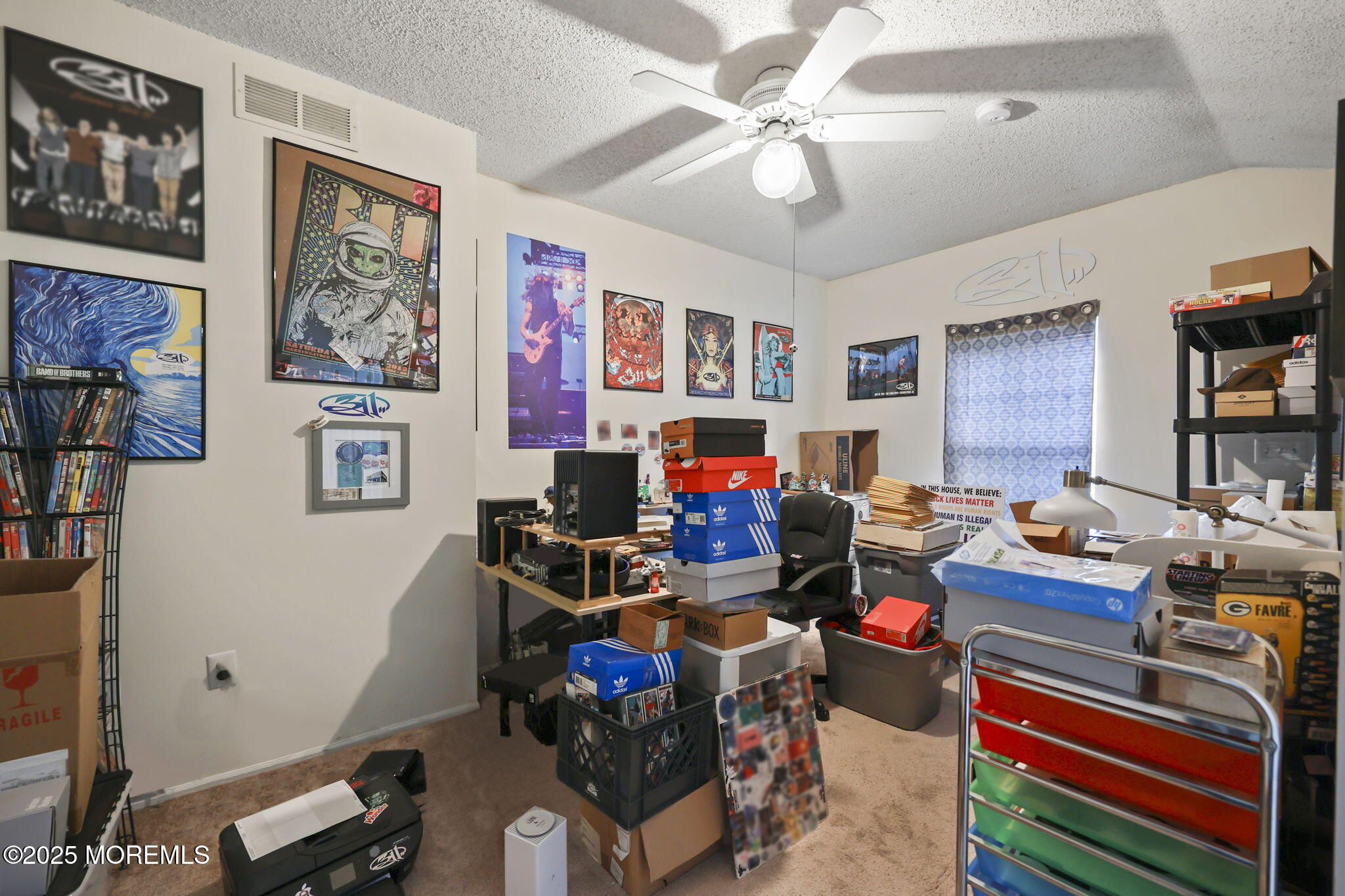 2 Madison Court Tinton Falls, NJ 07712 - Photo 20 of 22 a work room with furniture and a fan