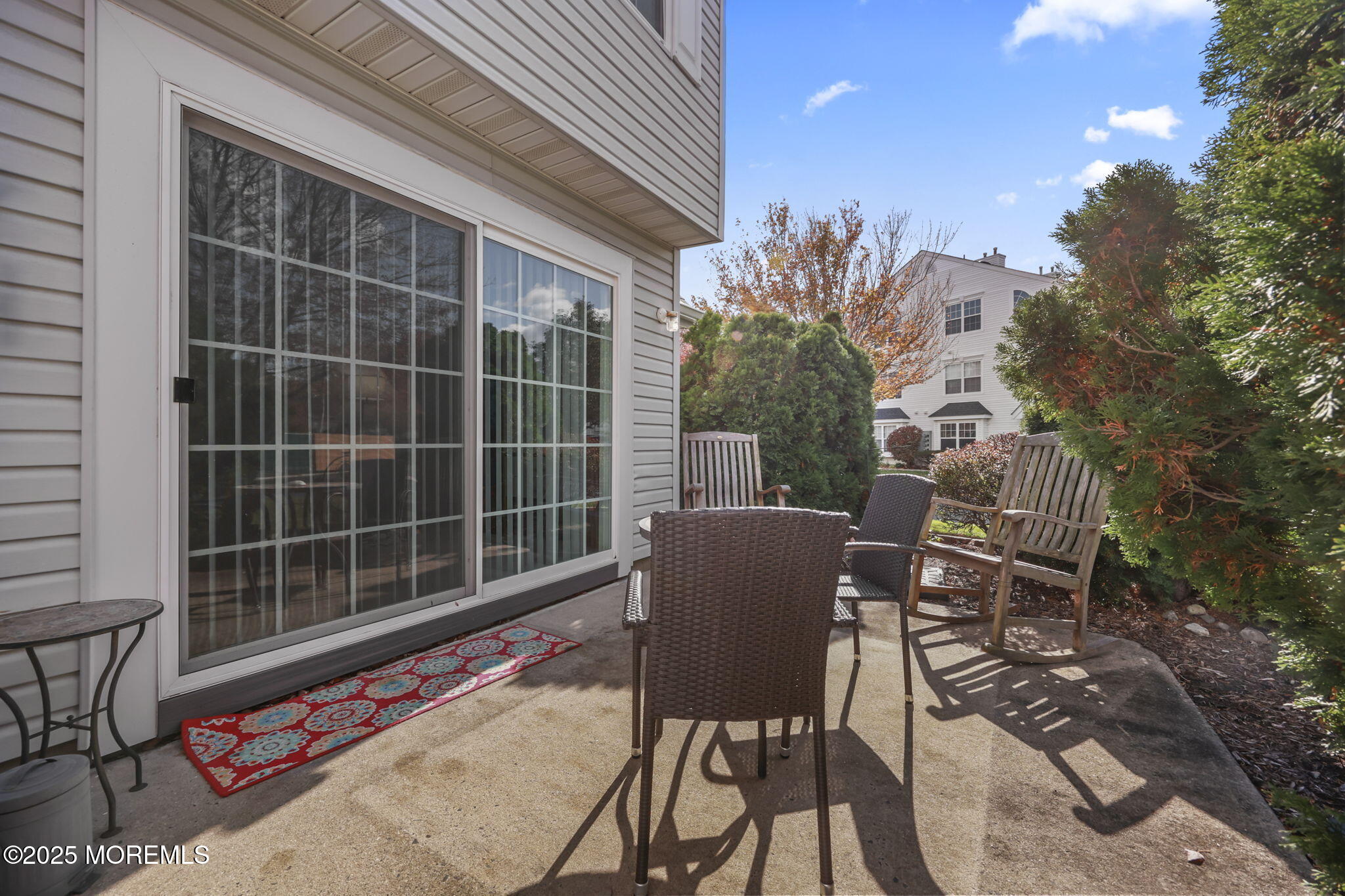 2 Madison Court Tinton Falls, NJ 07712 - Photo 21 of 22 a view of a chair and table in the backyard