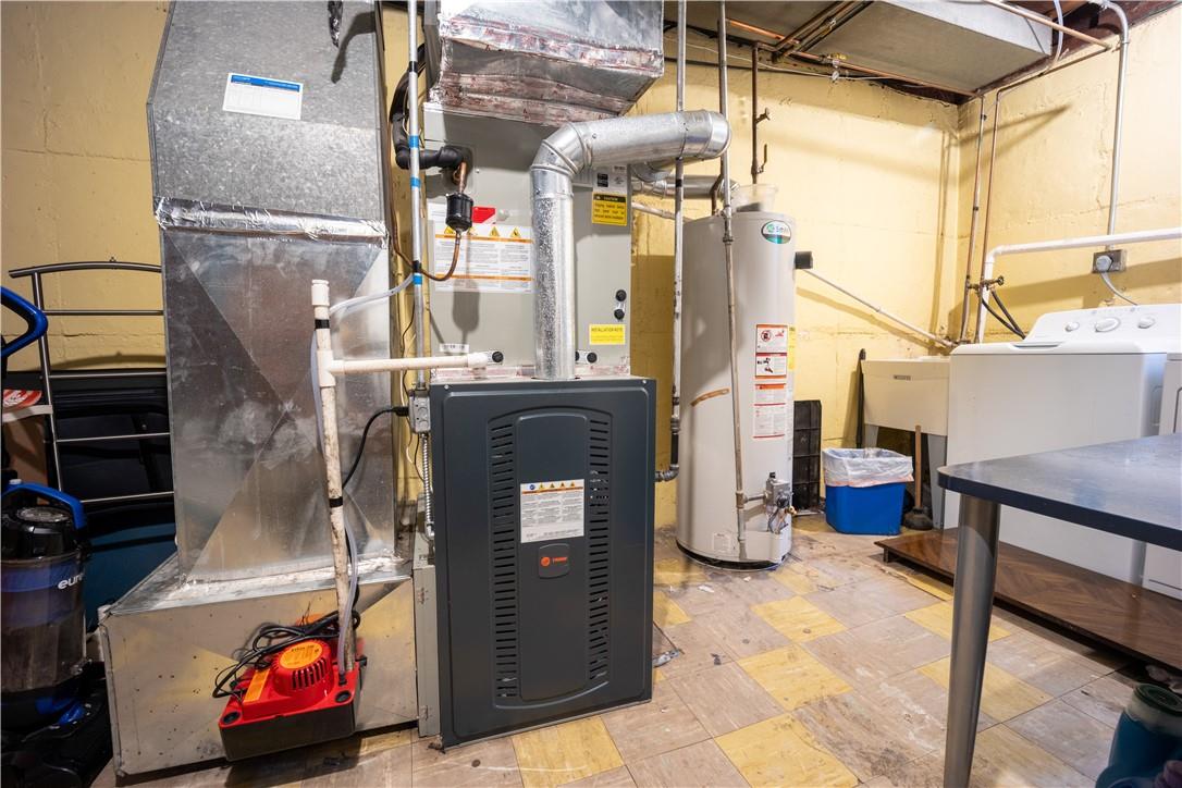 80-68 Springfield Boulevard Queens, NY 11427 - Photo 10 of 10 Utility room with washer and dryer and gas water heater