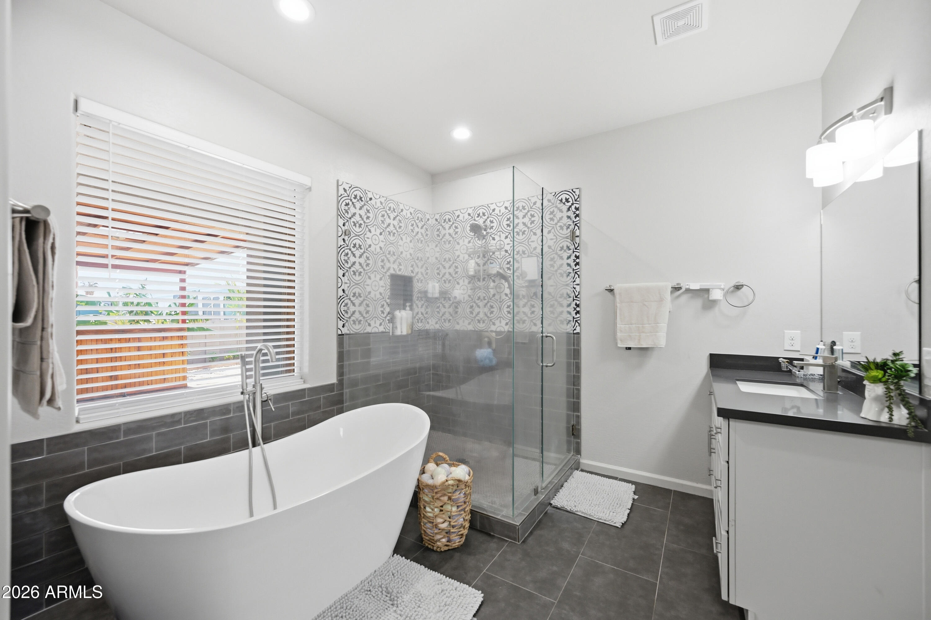 10547 East Baltimore Street Apache Junction, AZ 85120 - Photo 22 of 43 a bathroom with a sink and a bathtub