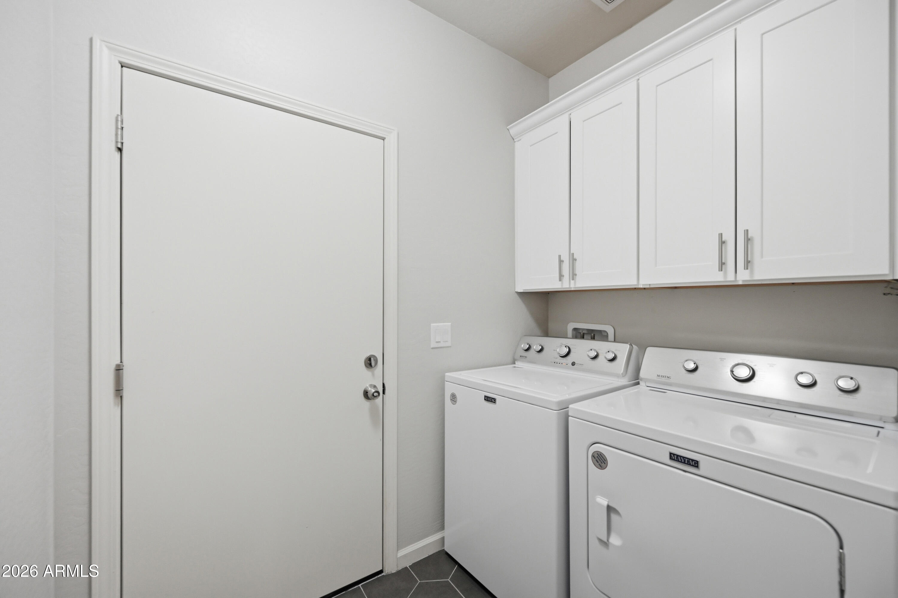 10547 East Baltimore Street Apache Junction, AZ 85120 - Photo 24 of 43 a view of storage and utility room with washer and dryer