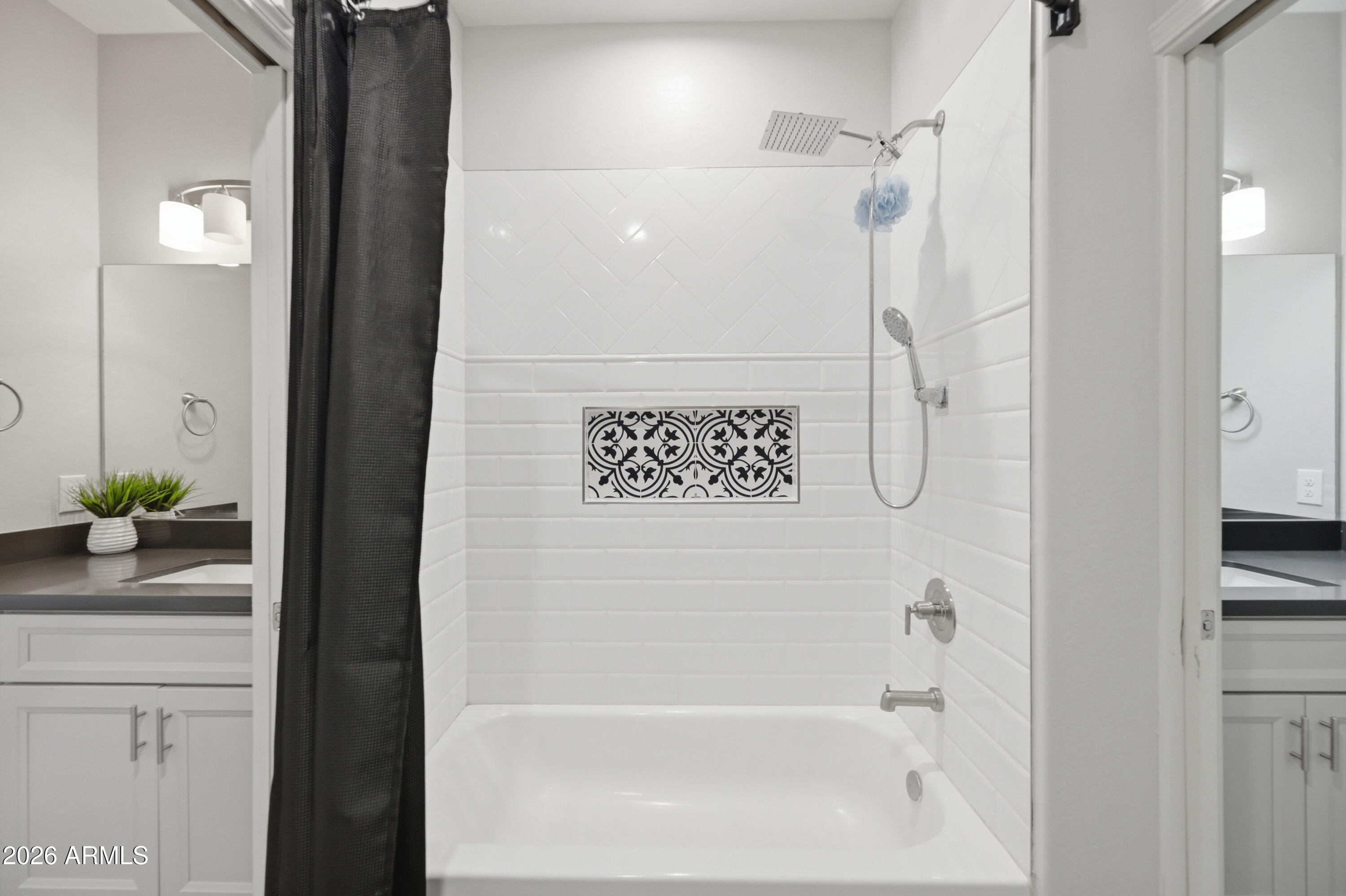 10547 East Baltimore Street Apache Junction, AZ 85120 - Photo 28 of 43 a bathroom with a bathtub and a shower