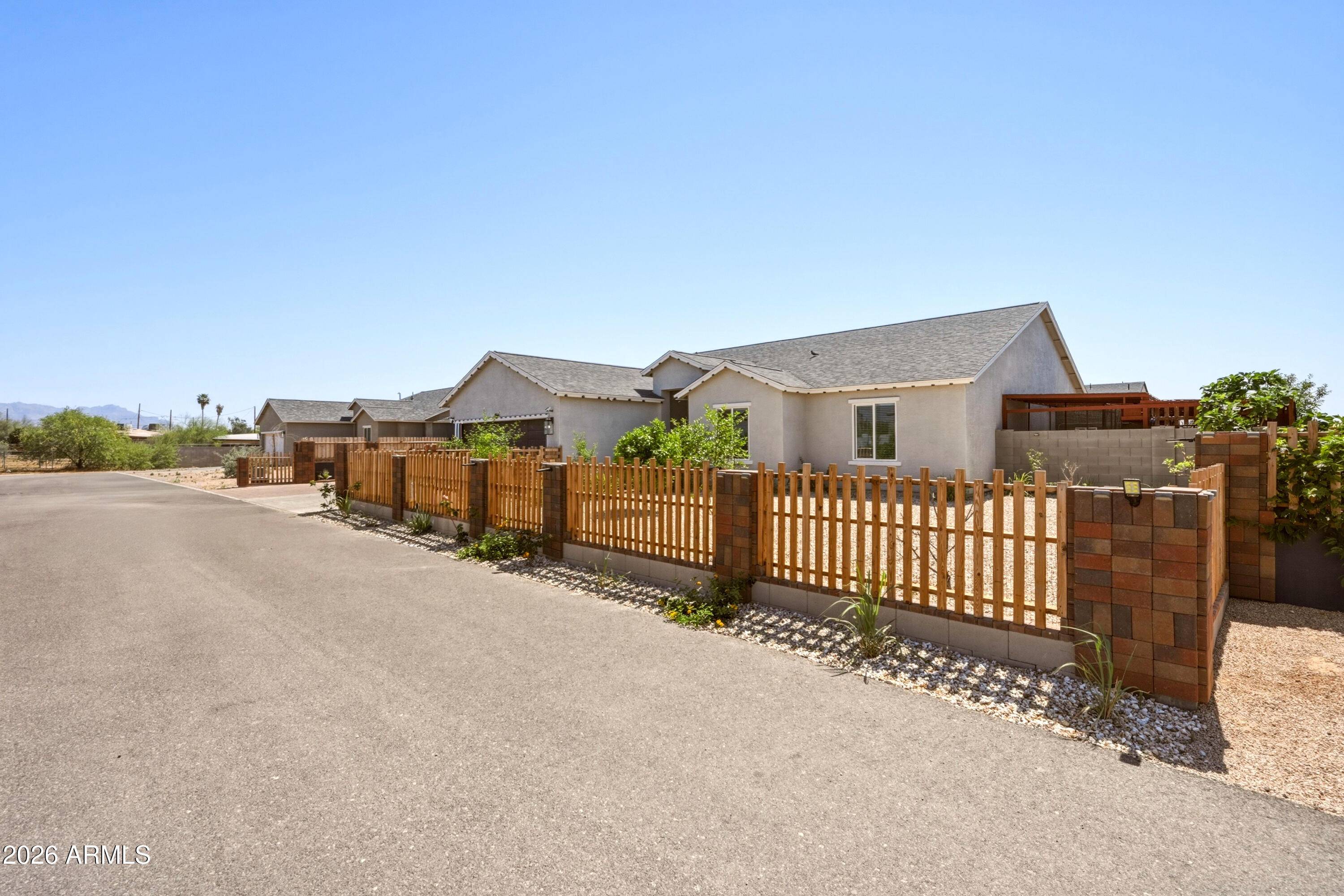 10547 East Baltimore Street Apache Junction, AZ 85120 - Photo 2 of 43 a view of a house with a street