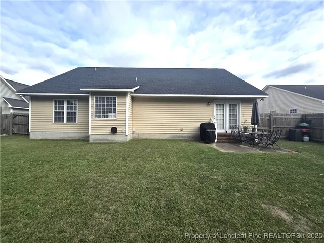 a house view with a garden space