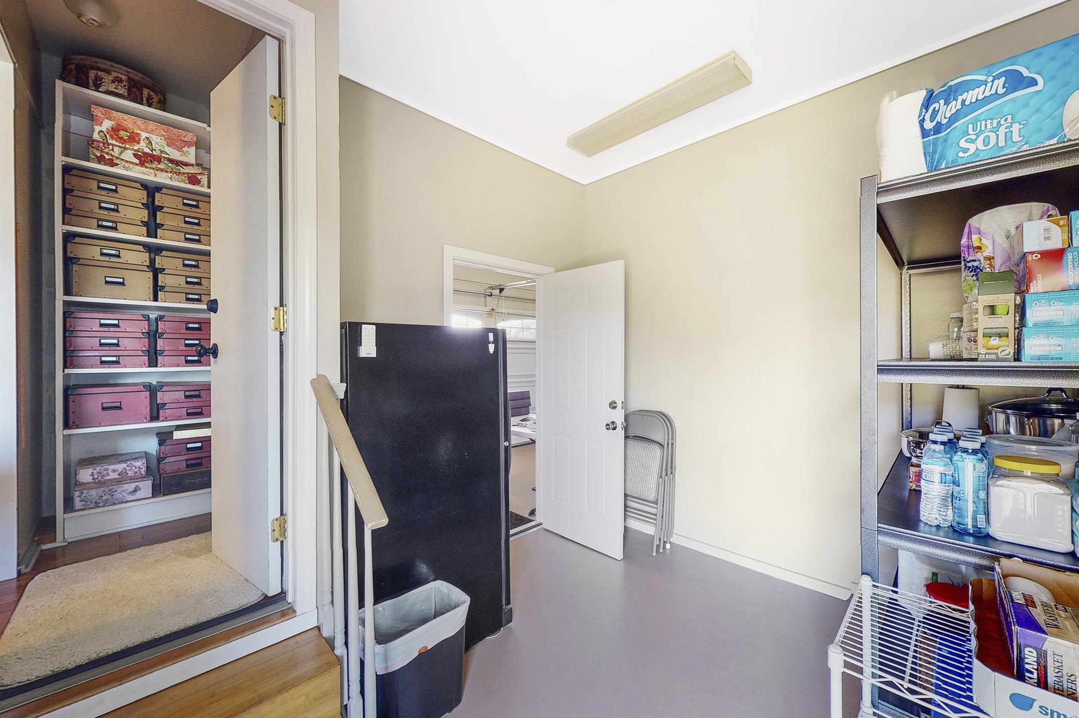 1480 Hog Back Road, Unit 1480 HOG BACK ROAD Haiku, HI 96708 - Photo 12 of 29 a view of a hallway with wooden floor and furniture