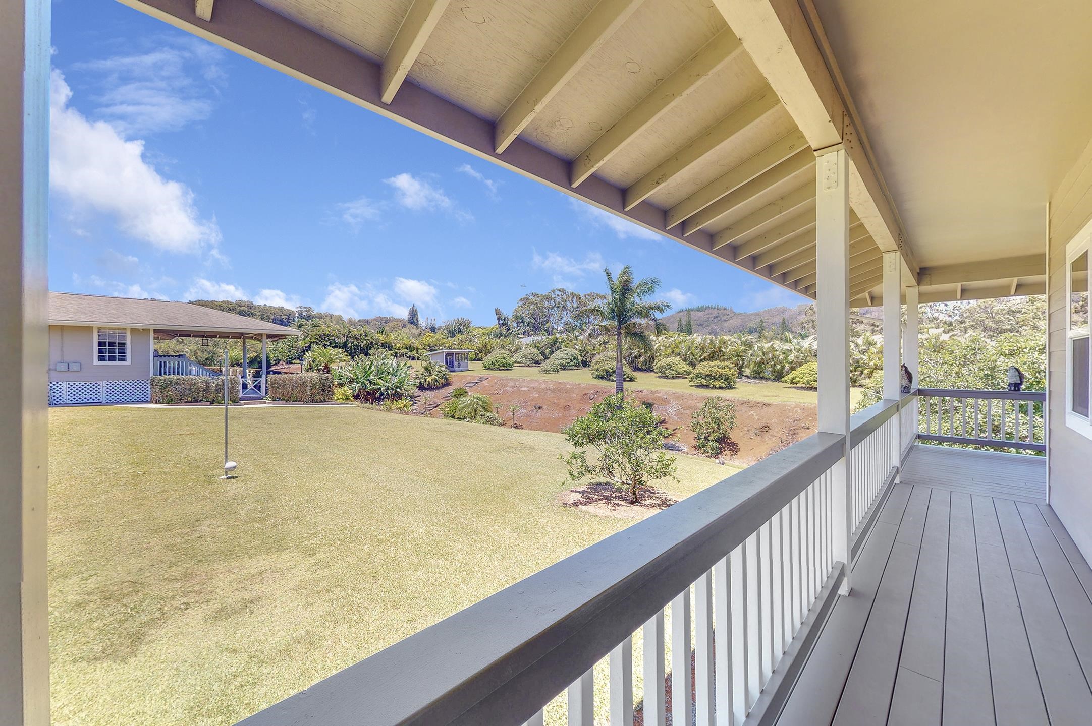 1480 Hog Back Road, Unit 1480 HOG BACK ROAD Haiku, HI 96708 - Photo 23 of 29 a view of swimming pool from a balcony