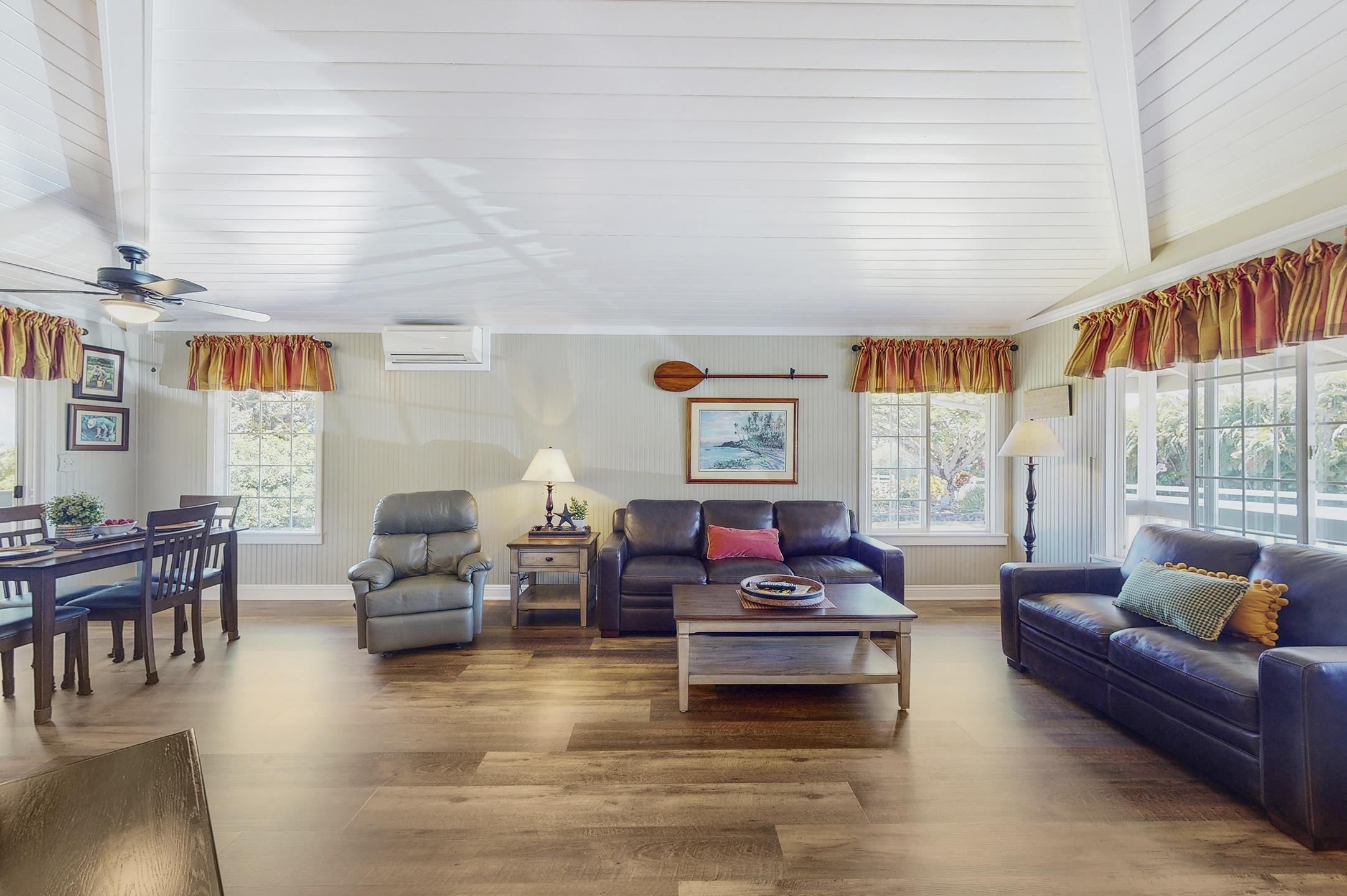 1480 Hog Back Road, Unit 1480 HOG BACK ROAD Haiku, HI 96708 - Photo 3 of 29 a living room with furniture and a large window