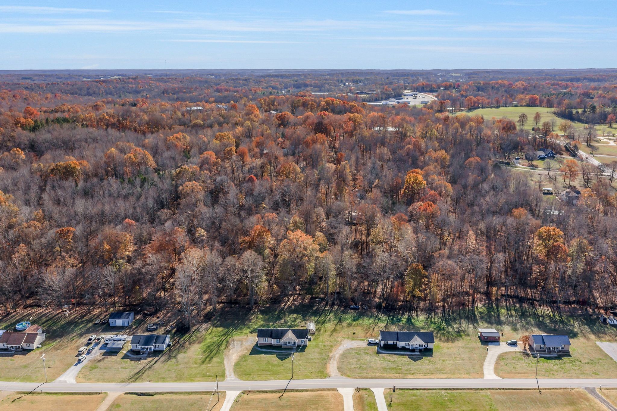 1427 St Paul Road Charlotte, TN 37036 - Photo 33 of 38 an aerial view of residential houses with outdoor space