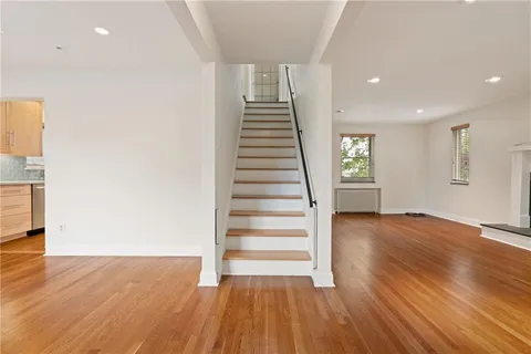 a bedroom with a bed and a closet