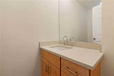 a bathroom with a shower and a toilet