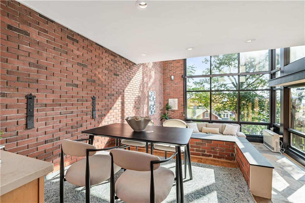 943 Wellesley Road Pittsburgh, PA 15206 - Photo 4 of 34 a dining room with furniture and window