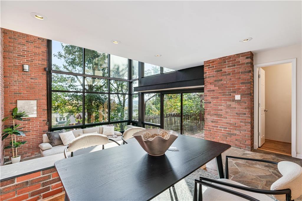 943 Wellesley Road Pittsburgh, PA 15206 - Photo 6 of 34 a view of a dining room with furniture window and outside view