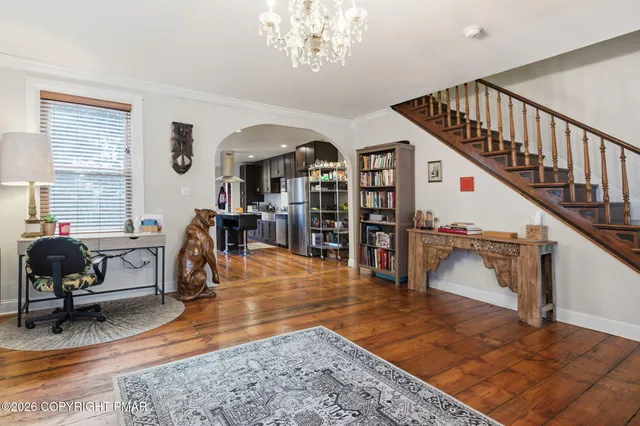 a view of a livingroom with furniture and a livingroom