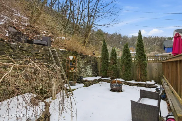 a view of a chairs on the deck