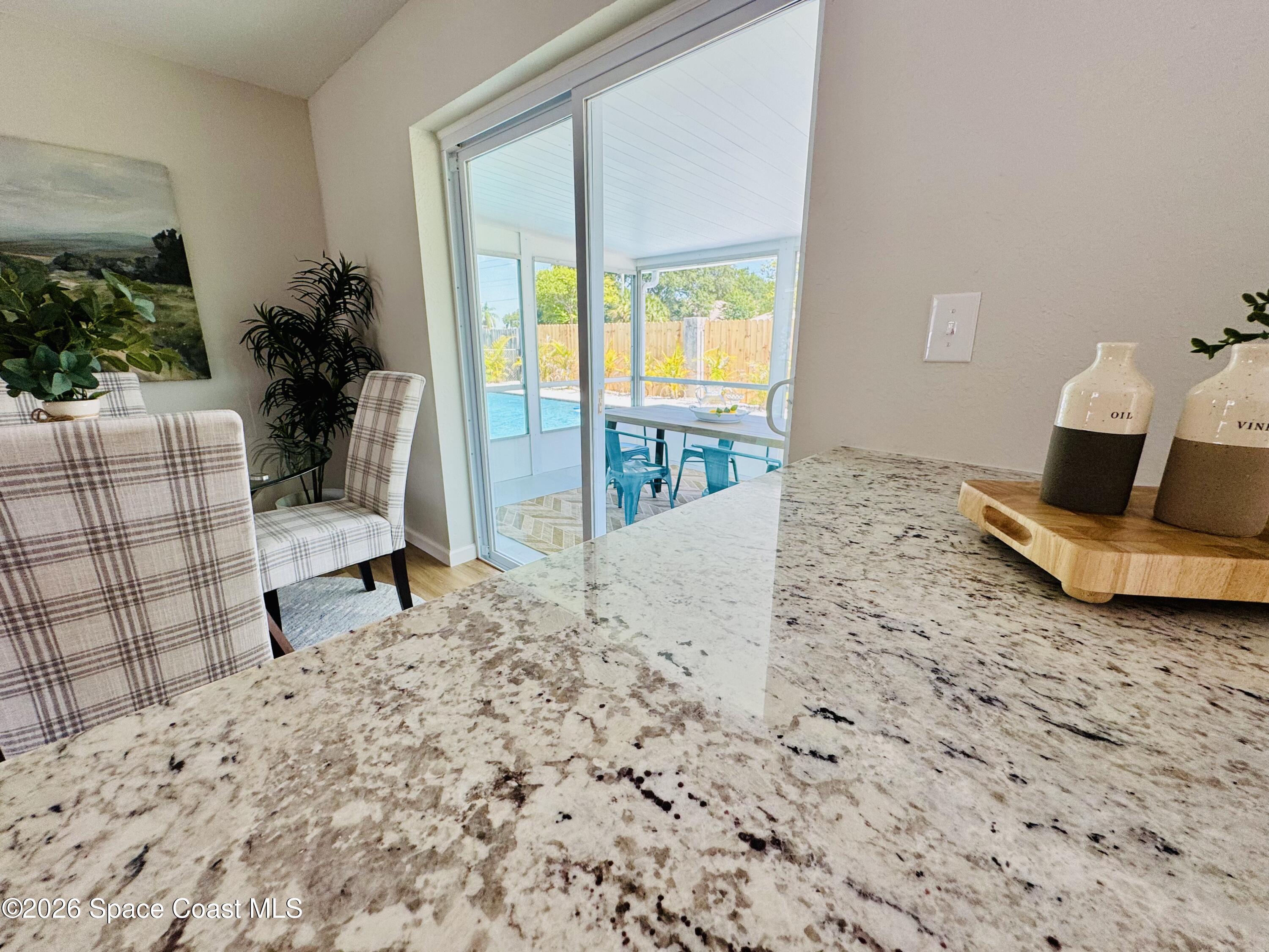 1910 Tallridge Road Melbourne, FL 32935 - Photo 20 of 34 Shot of sliding door over counter
