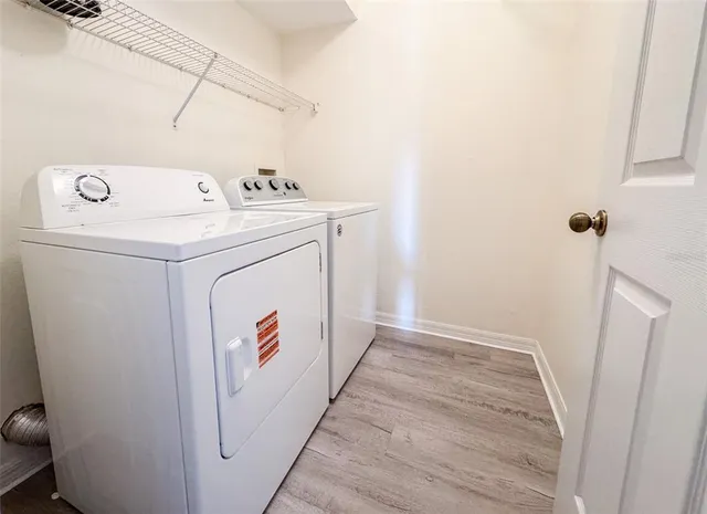a utility room with dryer and washer