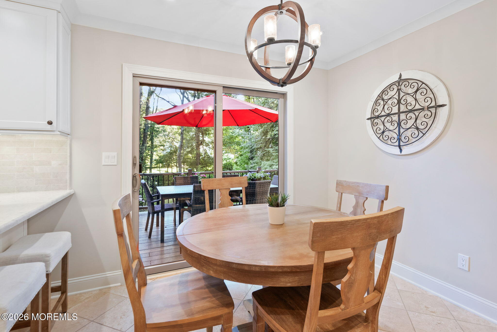 21 Stoney Brook Road Holmdel, NJ 07733 - Photo 9 of 40 a view of a dining room with furniture wooden floor and a rug