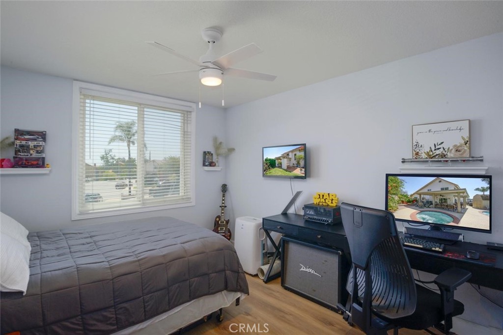 10424 Cartilla Court Rancho Cucamonga, CA 91737 - Photo 19 of 36 a bedroom with bed and a window