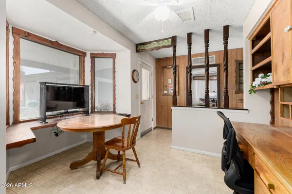a view of a dining room with furniture