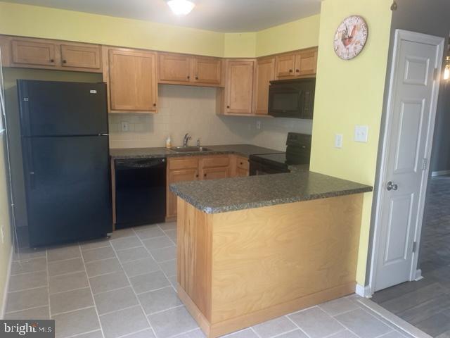 3608 Walnut Ridge Drive Pottstown, PA 19464 - Photo 13 of 28 a kitchen with a refrigerator sink and cabinets