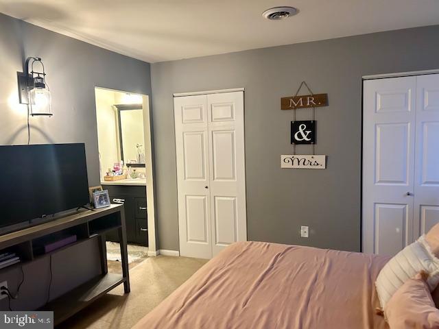 3608 Walnut Ridge Drive Pottstown, PA 19464 - Photo 19 of 28 a bedroom with a bed and a flat screen tv