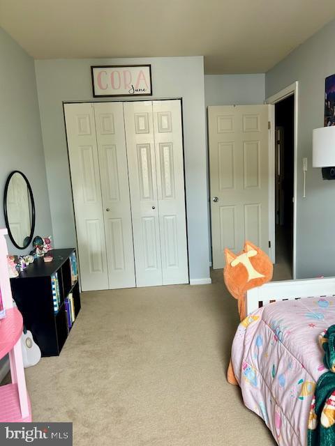 3608 Walnut Ridge Drive Pottstown, PA 19464 - Photo 22 of 28 a bedroom with a bed and wooden floor