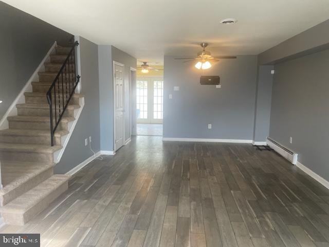 3608 Walnut Ridge Drive Pottstown, PA 19464 - Photo 3 of 28 a view of a room with wooden floor and staircase