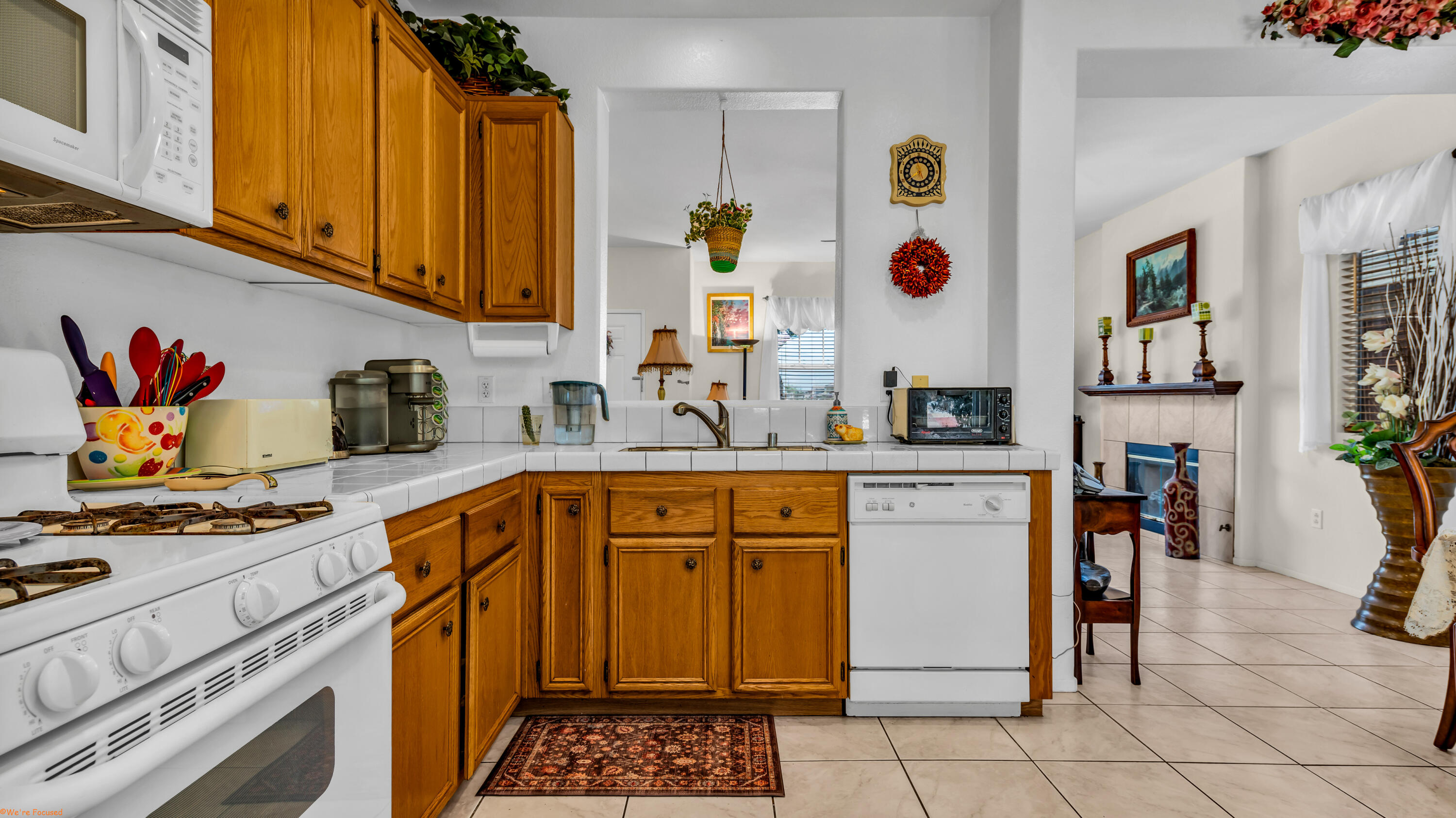 83644 Jaderock Road Coachella, CA 92236 - Photo 11 of 42 a kitchen with stainless steel appliances a stove a sink and a microwave