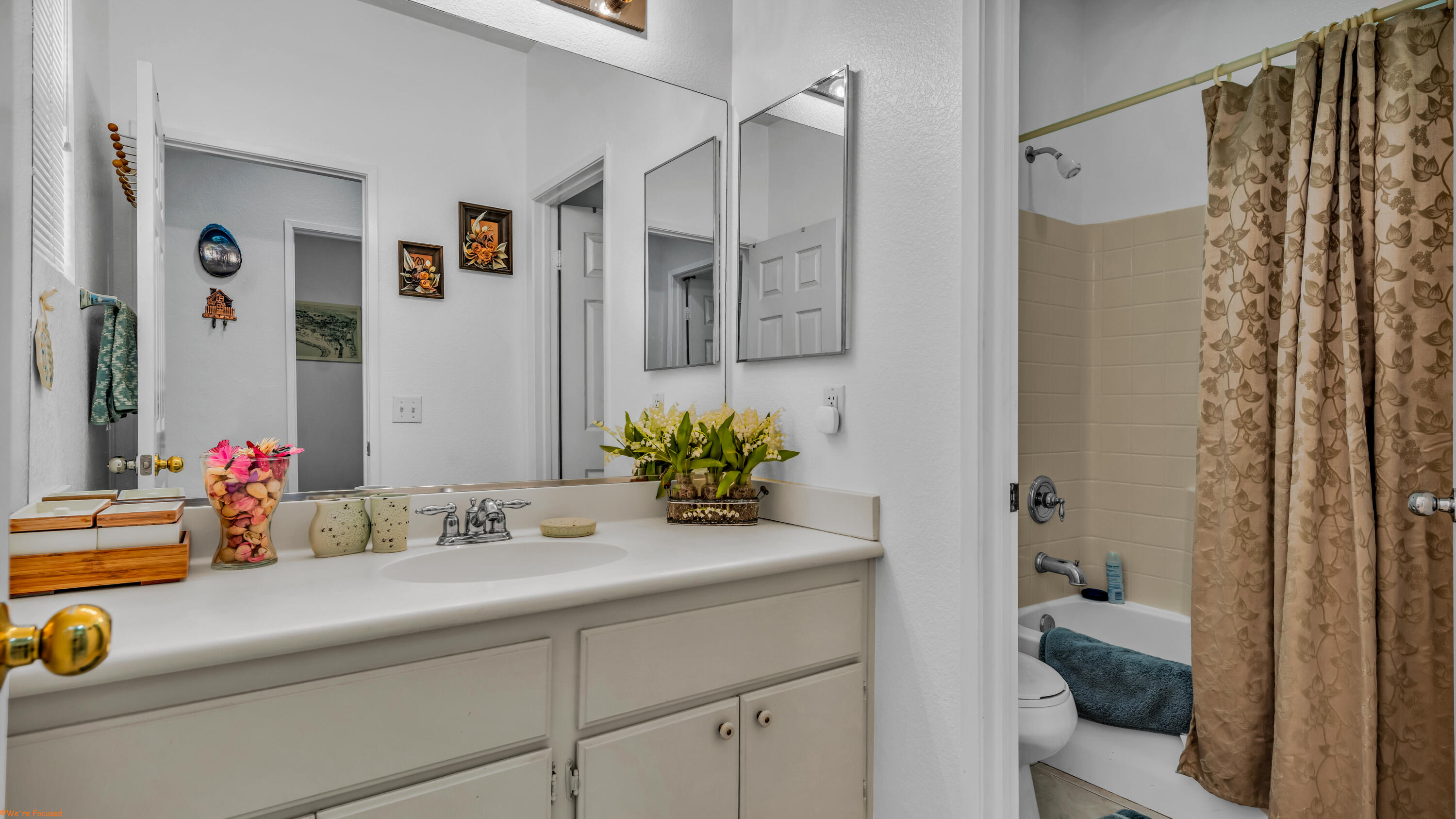 83644 Jaderock Road Coachella, CA 92236 - Photo 20 of 42 a bathroom with a sink double vanity and a shower