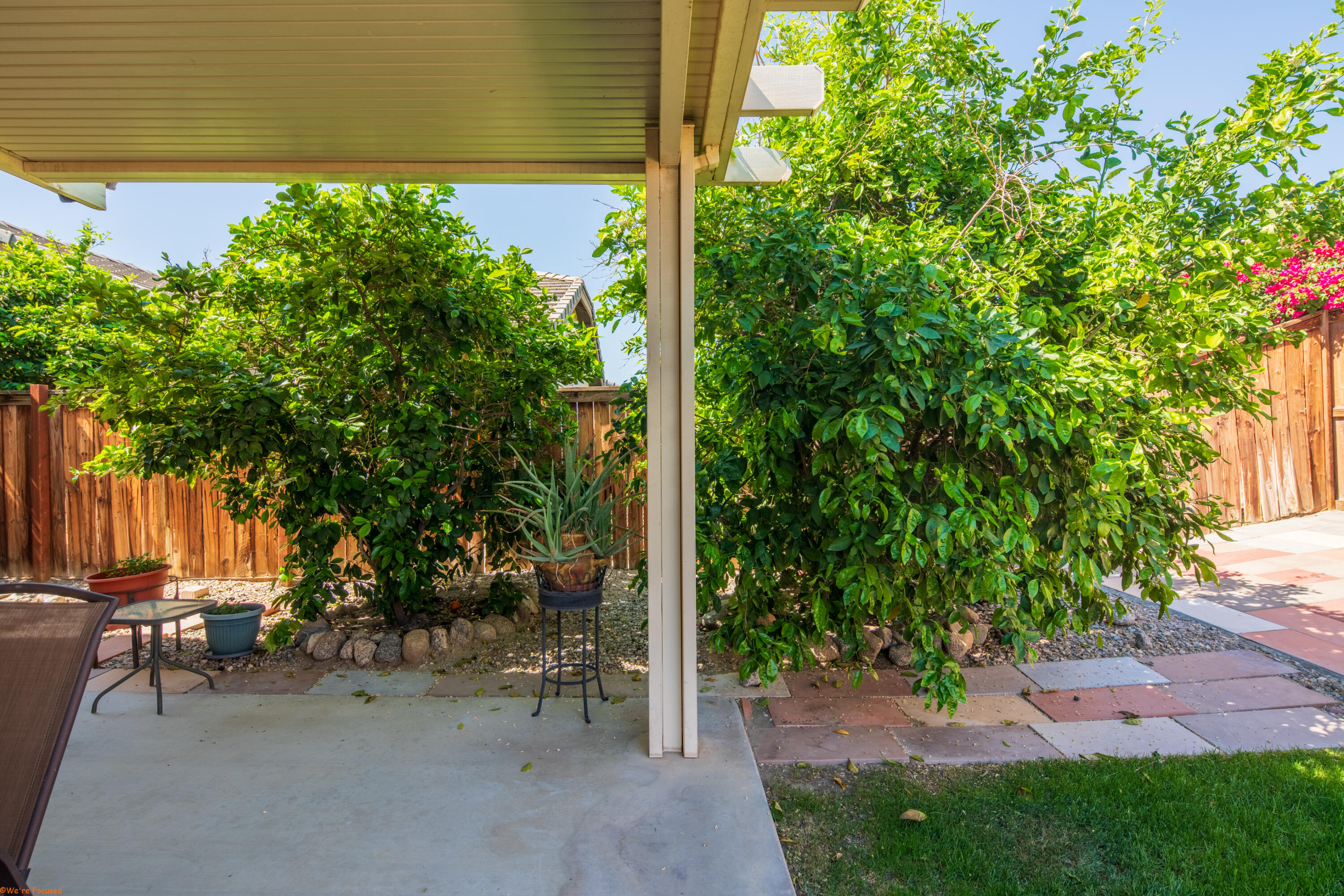 83644 Jaderock Road Coachella, CA 92236 - Photo 27 of 42 a backyard of a house with lots of green space and garden view