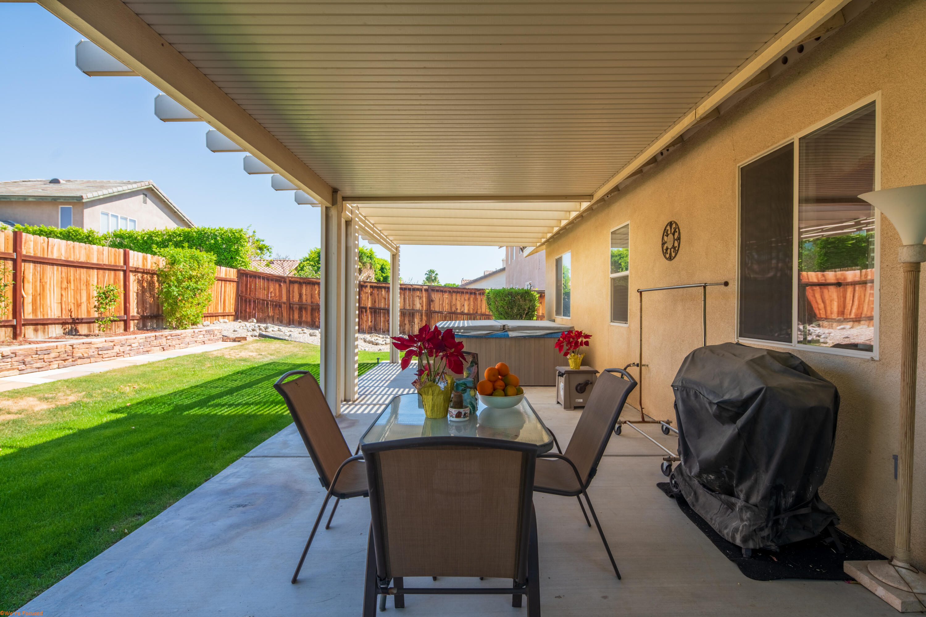 83644 Jaderock Road Coachella, CA 92236 - Photo 28 of 42 a view of an outdoor dining space with a table and chairs