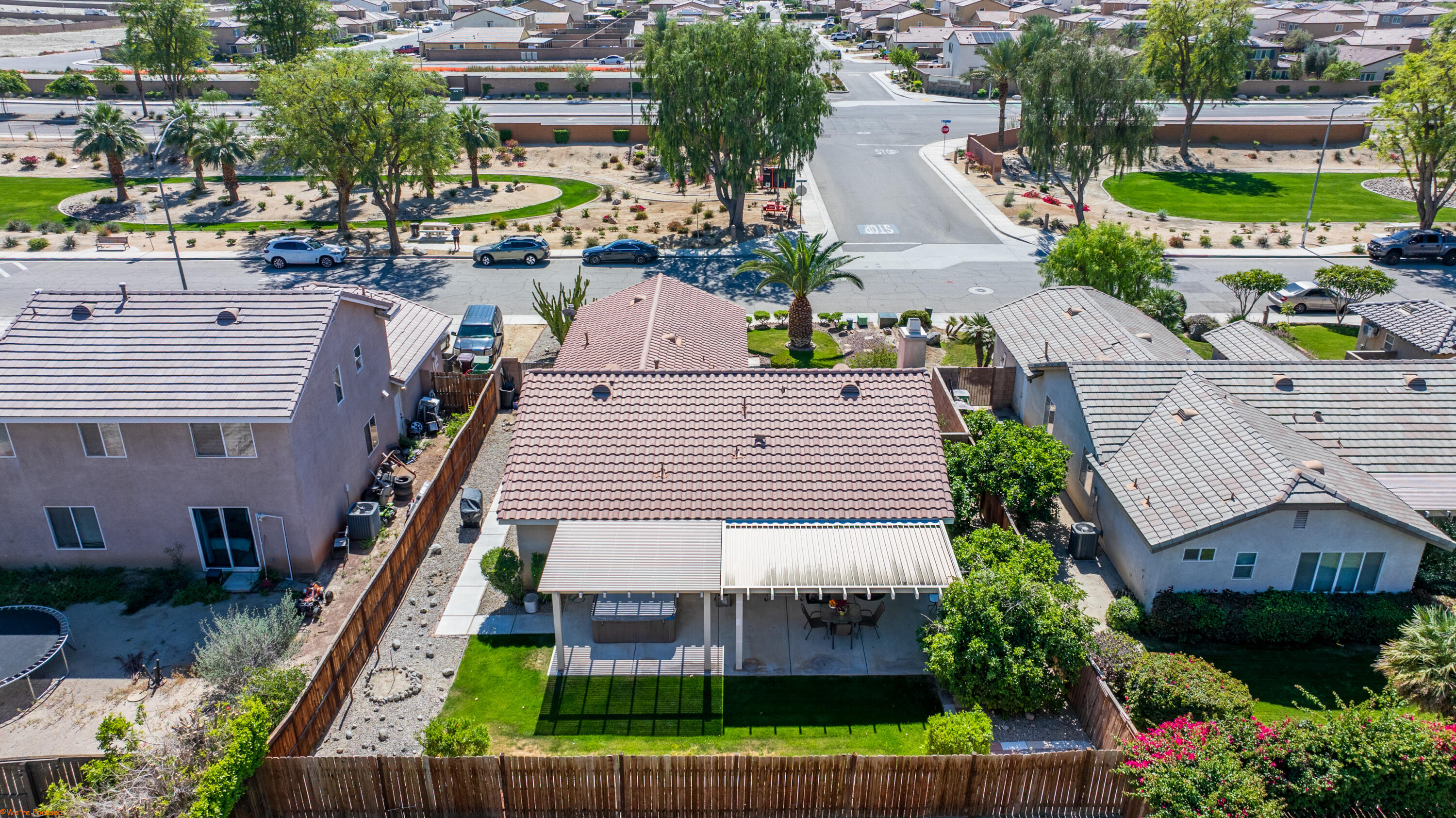 83644 Jaderock Road Coachella, CA 92236 - Photo 34 of 42 a view of a house with a yard and potted plants