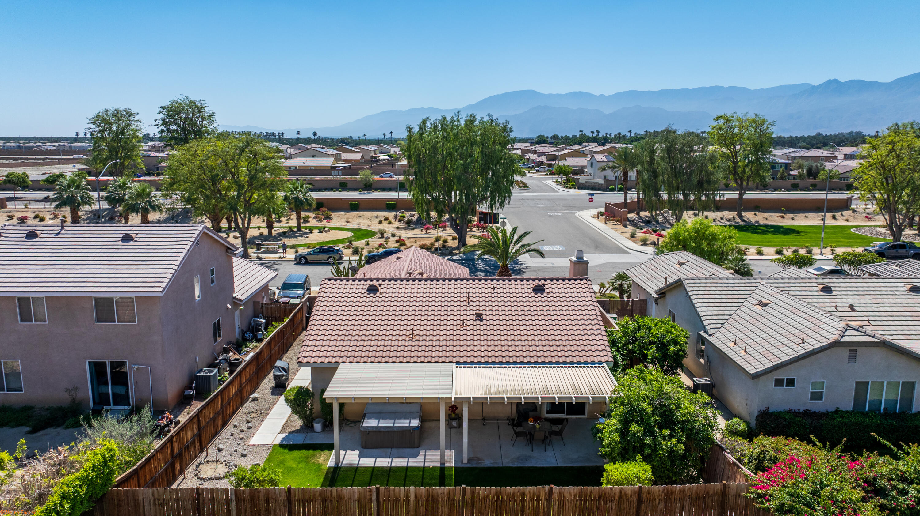 83644 Jaderock Road Coachella, CA 92236 - Photo 35 of 42 an aerial view of multiple houses with a yard