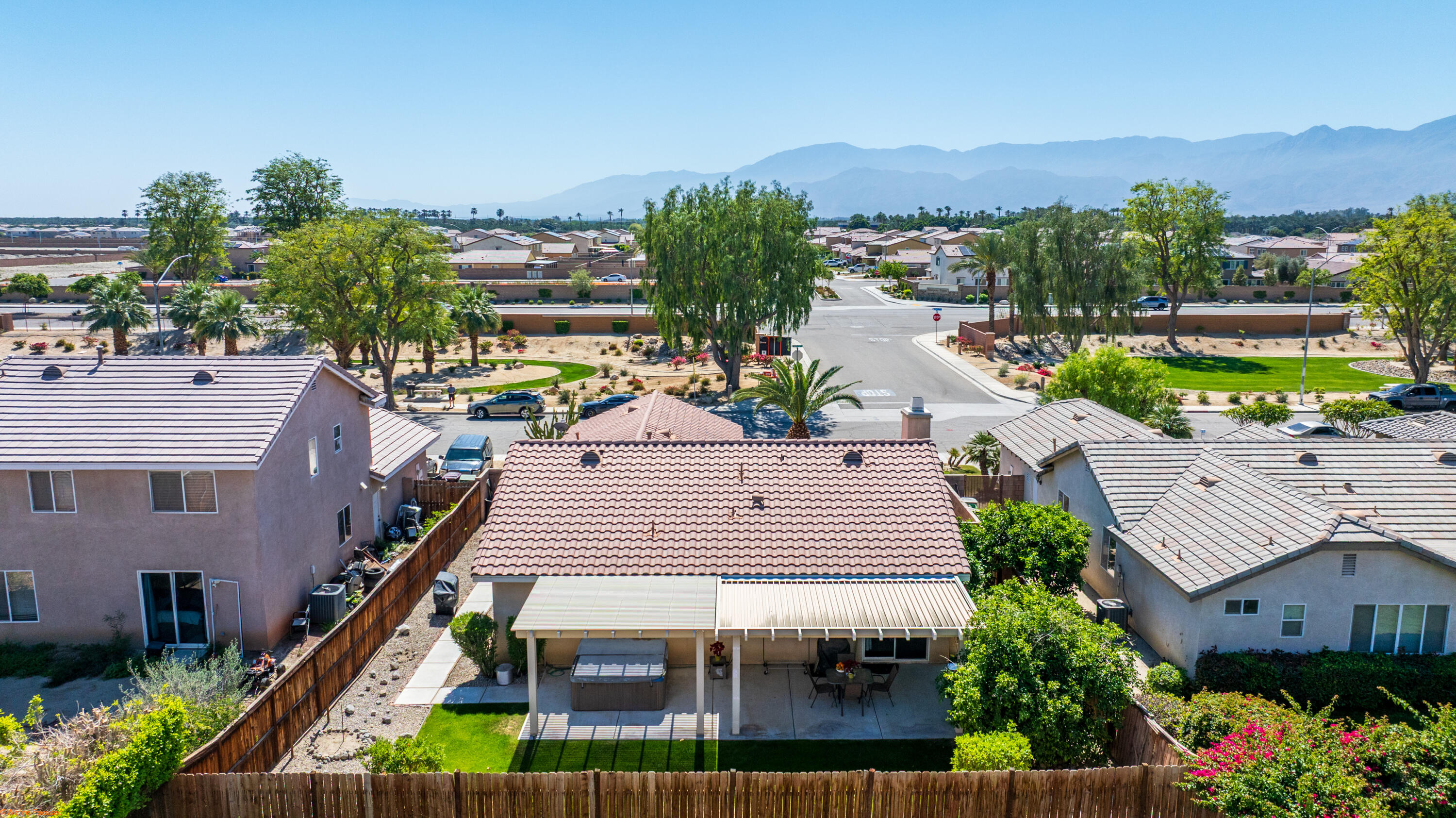 83644 Jaderock Road Coachella, CA 92236 - Photo 36 of 42 an aerial view of multiple houses with a yard