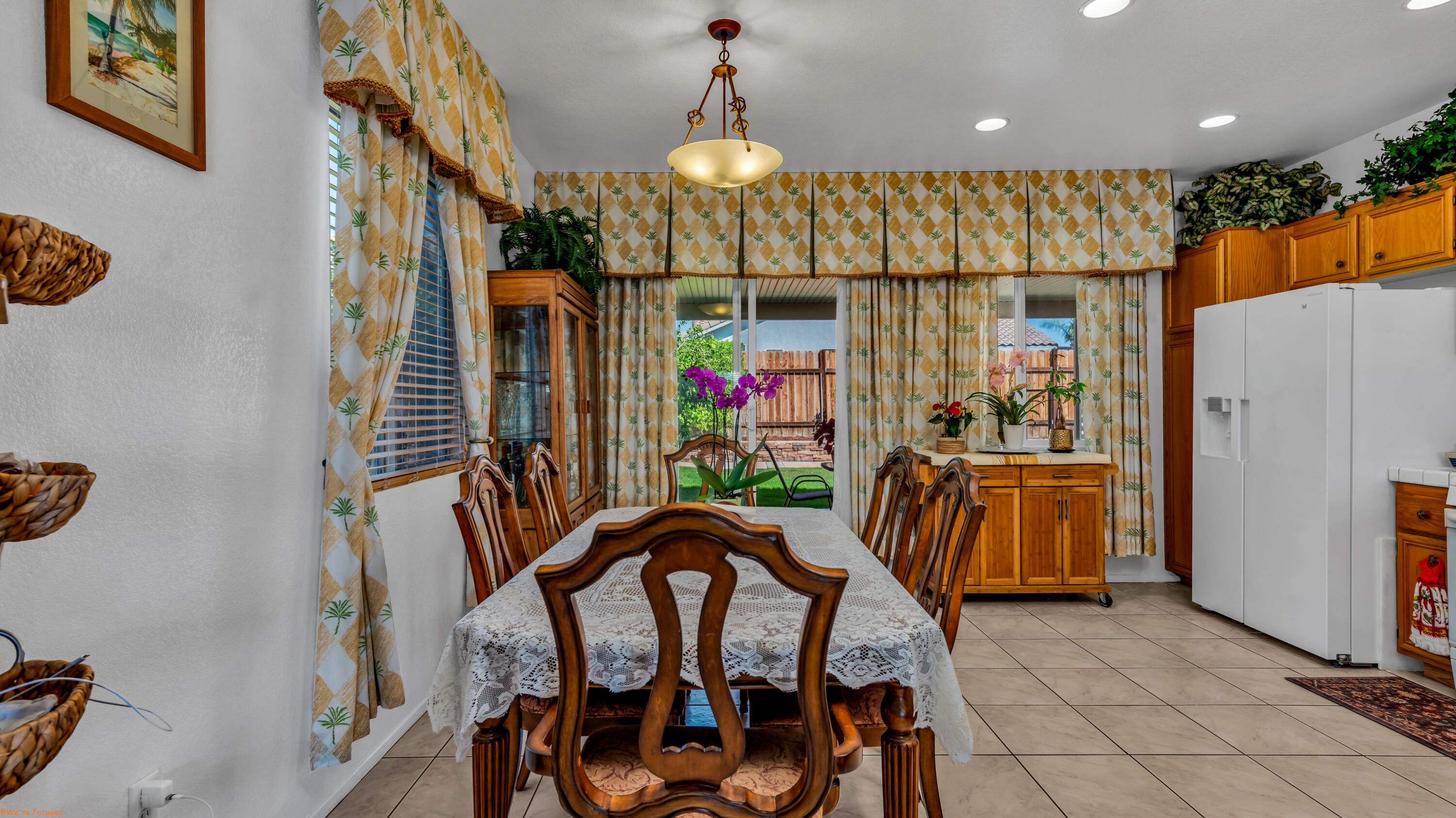 83644 Jaderock Road Coachella, CA 92236 - Photo 8 of 42 a view of a dining room with furniture window and wooden floor