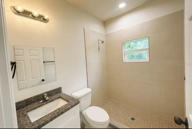 a bathroom with a toilet