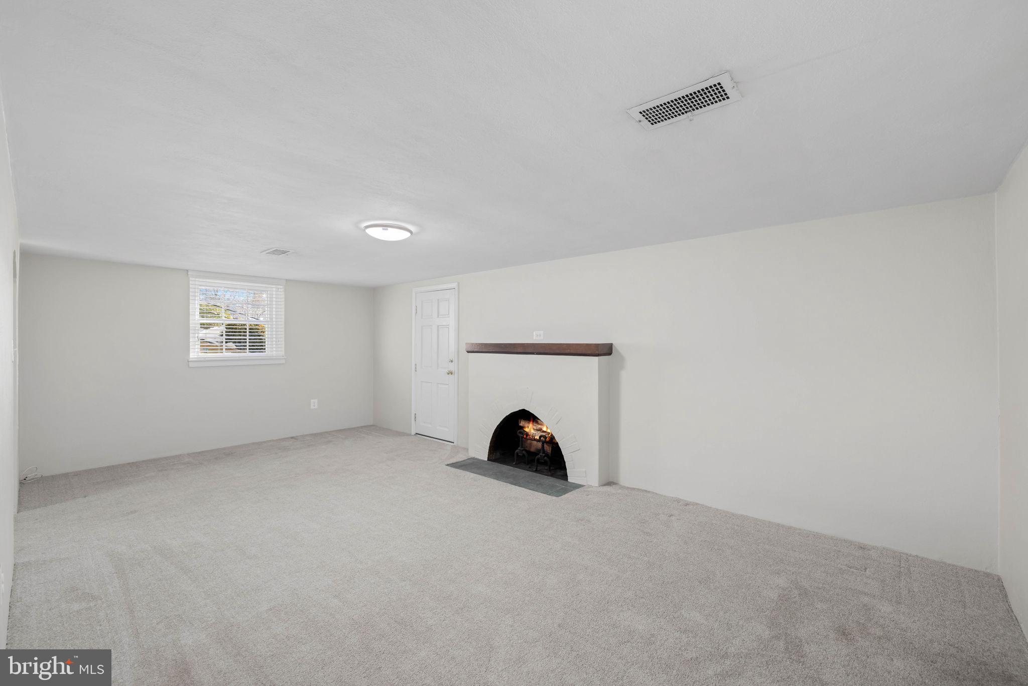 4545 32nd Road North Arlington, VA 22207 - Photo 47 of 73 Lower level rec room with fireplace