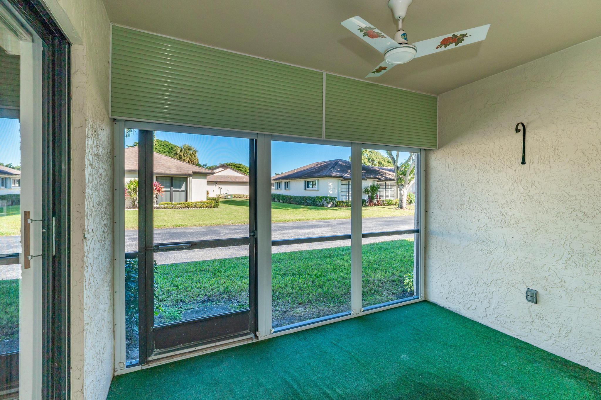 4869 Equestrian Road, Unit B Boynton Beach, FL 33436 - Photo 17 of 21 Screened Patio