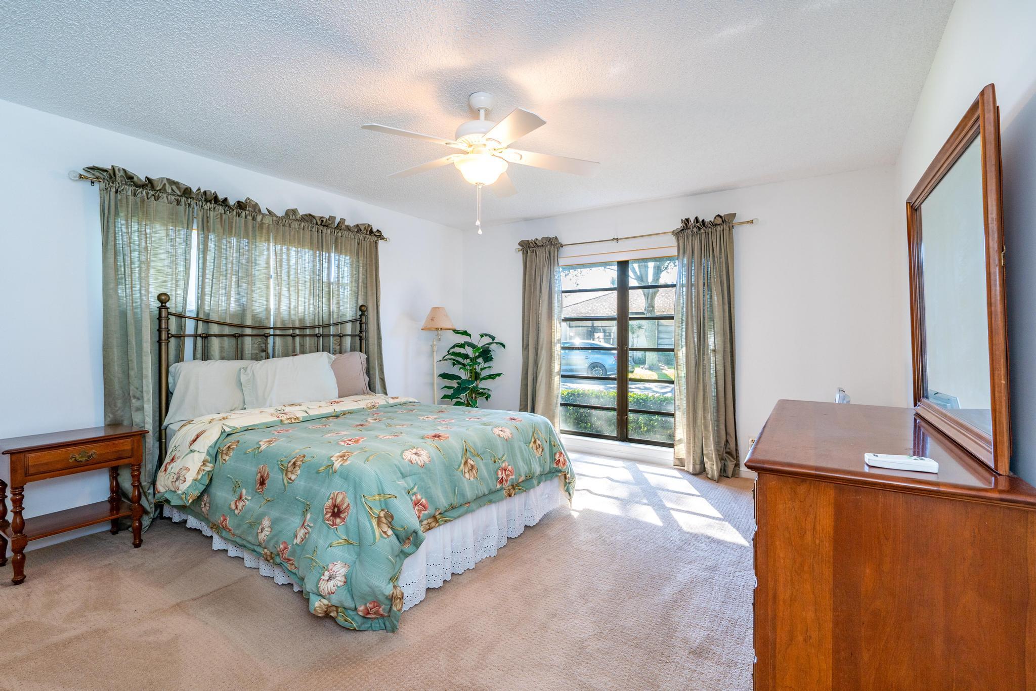 4869 Equestrian Road, Unit B Boynton Beach, FL 33436 - Photo 10 of 21 Primary Bedroom